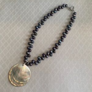 Handcrafted pearl and shell necklace